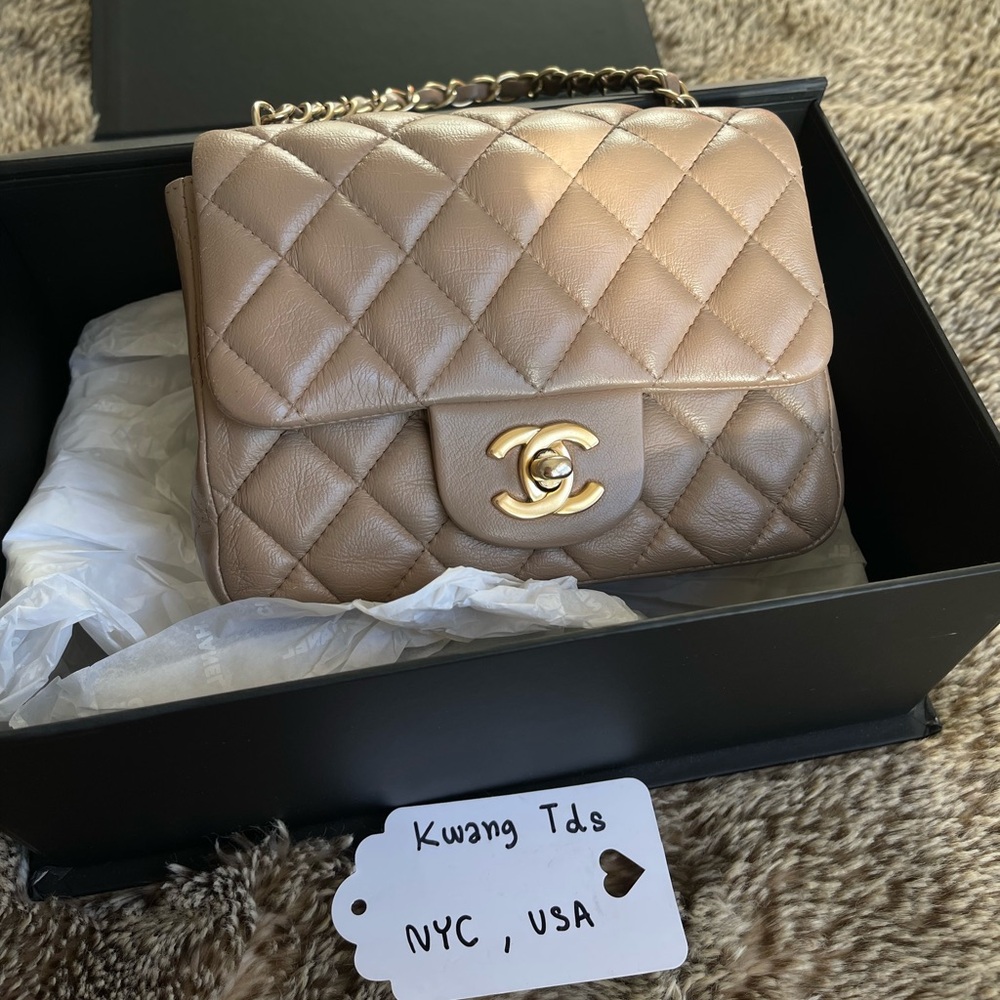 Chanel square mini 7” with matte gold hardware.